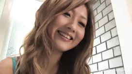 Young Japanese chick cuts a hole on her jeans crotch and strokes hairy cunt with vibrator