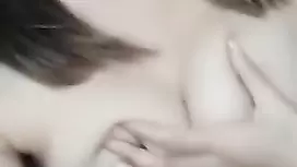 Awesome sexy shaped teen Asian girl is stroking her tits and rubbing pussy